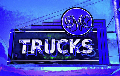 Photo Of An Old Gmc Trucks Sign - Art Print